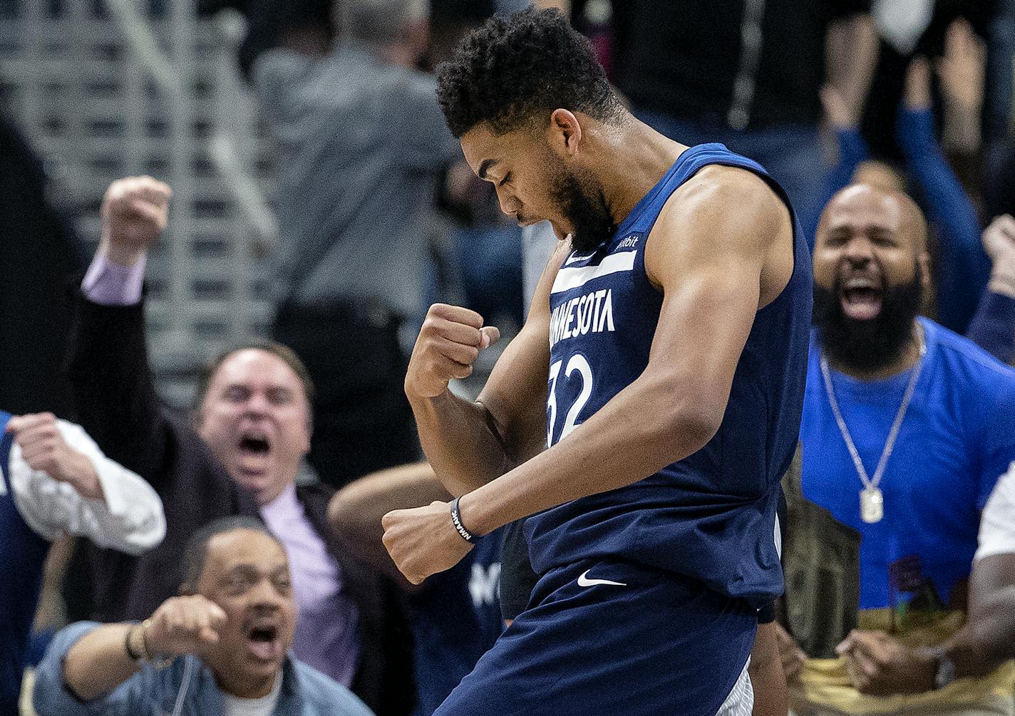 The Minnesota Timberwolves' Karl-Anthony Towns (32) reacts after scoring in the third quarter against the Houston Rockets in Game 3 of the first-round NBA Playoff series on Saturday, April 21, 2018, at the Target Center in Minneapolis. The Timberwolves won, 121-105, to trail the series, 2-1. (Carlos Gonzalez/Minneapolis Star Tribune/TNS) ORG XMIT: 1229228