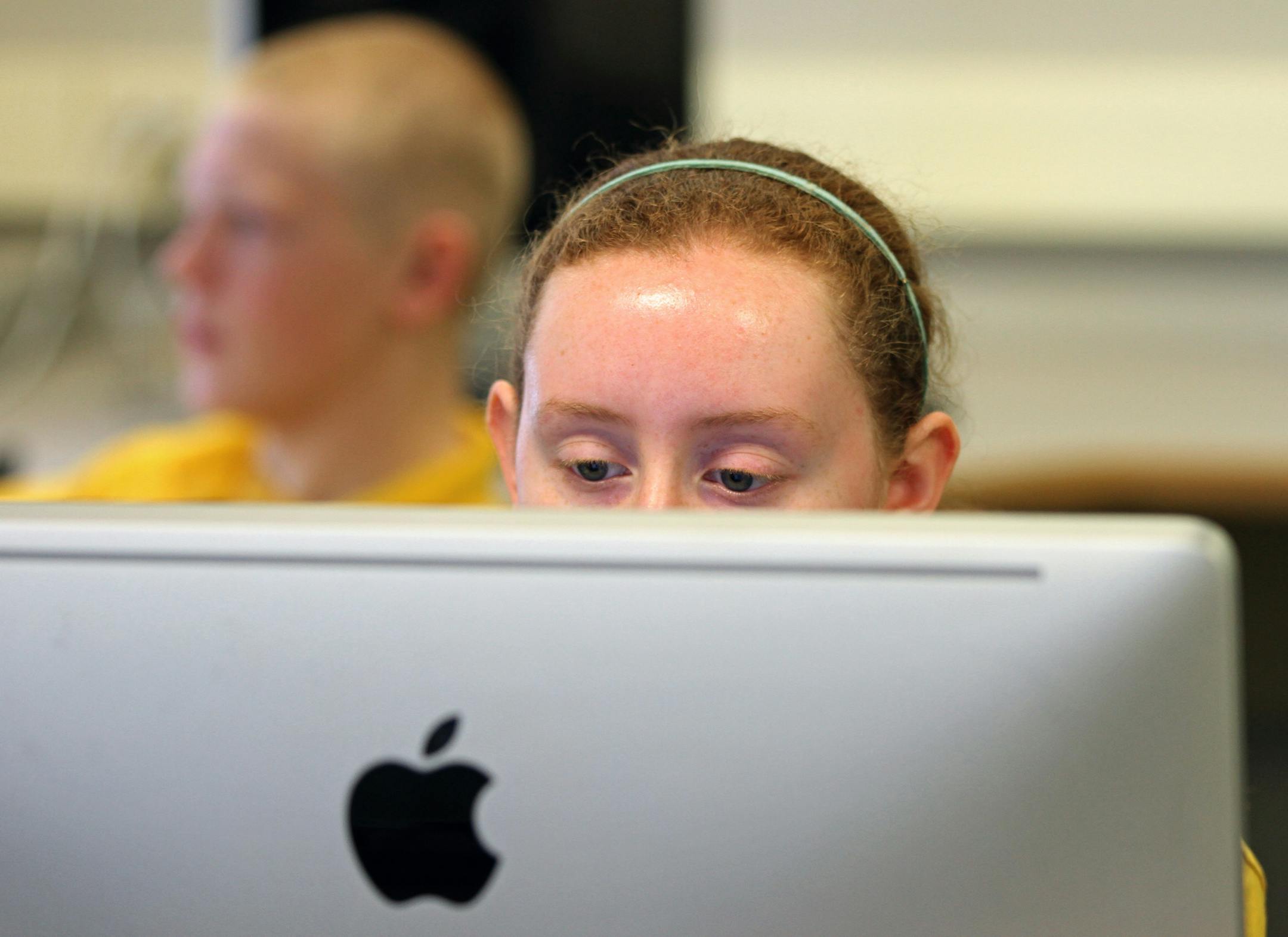 (center) Columbia Academy Student Emma Walker worked with other students in the 8th grade Media Arts class on media lab computers. Nearly half of all the kids who live in Columbia Heights School District boundaries go elsewhere. The district is now surveying parents to figure out why. They did a smaller survey and realized while the elementary schools were robust, parents pulled their kids out at the middle school. The district turned their middle school into an academy complete with uniforms, b