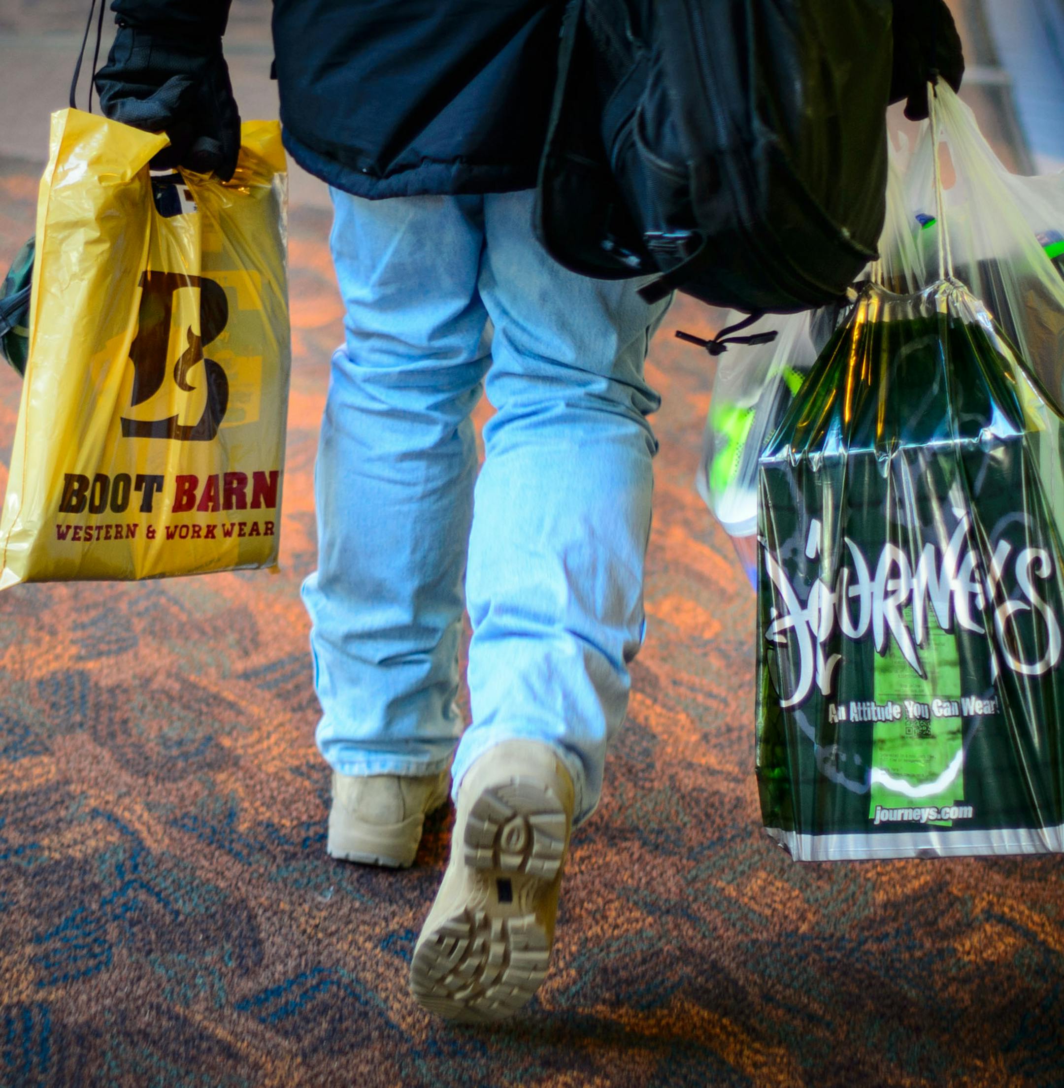Shoppers at the Mall of America. Some took advantage of school closures due to below zero temperatures. Retail hires had a strong showing in the latest jobs numbers. Thursday, January 23, 2014. ] GLEN STUBBE * gstubbe@startribune.com