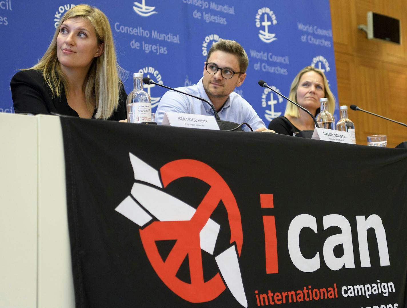 Beatrice Fihn, left, Executive Director of the International campaign to abolish Nuclear Weapons, ICAN, Daniel Hogsta, center, coordinator of the International campaign to abolish Nuclear Weapons, ICAN, and Grethe Ostern, right, member of the steering committee, speaks during a press conference, at the headquarters of the International campaign to abolish Nuclear Weapons, ICAN, in Geneva, Switzerland, on Friday, Oct. 6, 2017. ICAN is the winner of this year's Nobel Peace Prize. The Norwegian Nob