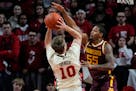 Gophers guard Ta’lon Cooper defended a shot by Rutgers’ Cam Spencer during Wednesday’s road loss.