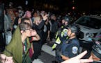 WASHINGTON, DC ,  - MAY 8: Protesters clash with the MPD on 21st and H St. outside the George Washington University encampment on May 8, 2024, in Wash