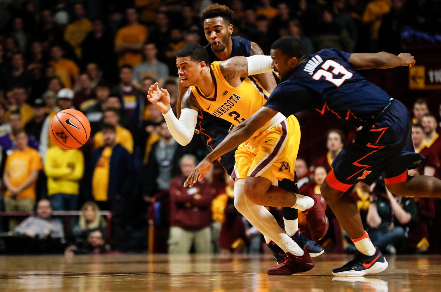 Gophers guard Nate Mason chased after a loose ball Wednesday against Illinois.