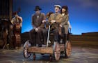 Jon Andrew Hegge takes Robert O. Berdahl and Ann Michels to their destination in "Sweet Land, the Musical" at the History Theatre.