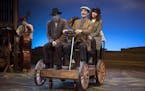 Jon Andrew Hegge takes Robert O. Berdahl and Ann Michels to their destination in "Sweet Land, the Musical" at the History Theatre.