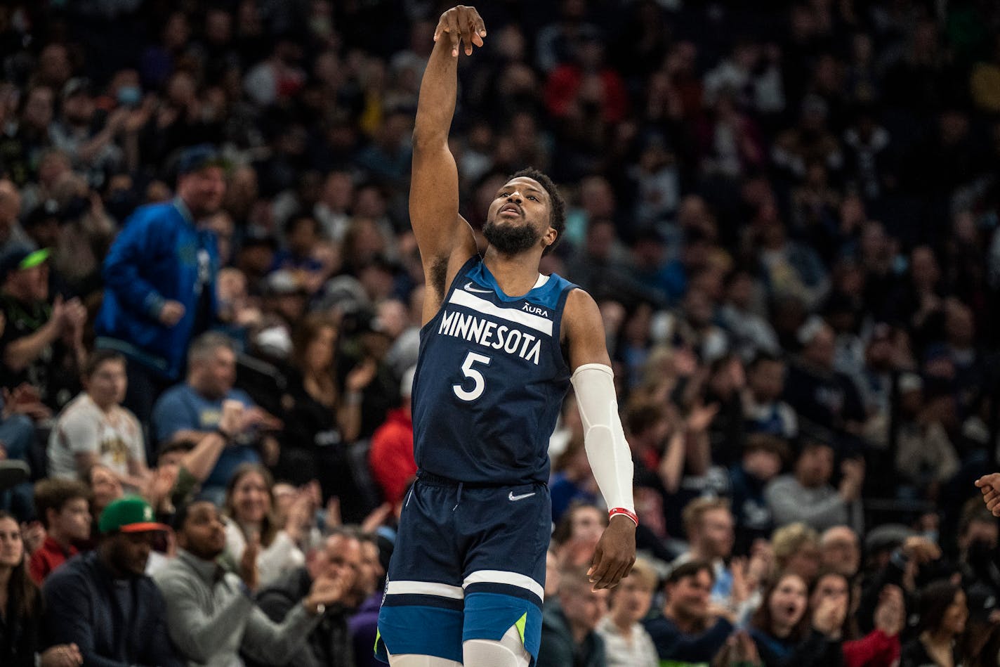 Minnesota Timberwolves guard Malik Beasley (5) celebrates his 3 point score late in the 4 quarter in Minneapolis, Minn., on Tuesday, March 1, 2022.