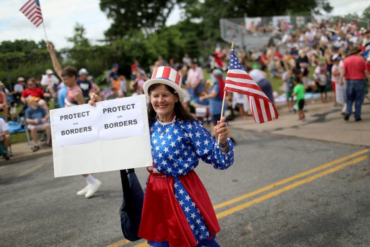 A few dozen folks from the Minnesota GOP promoting the party and President Trump's re-election, including Marilyn Downs, participated in the Edina July 4 parade Thursday, July 4, 2019, in Edina, MN.