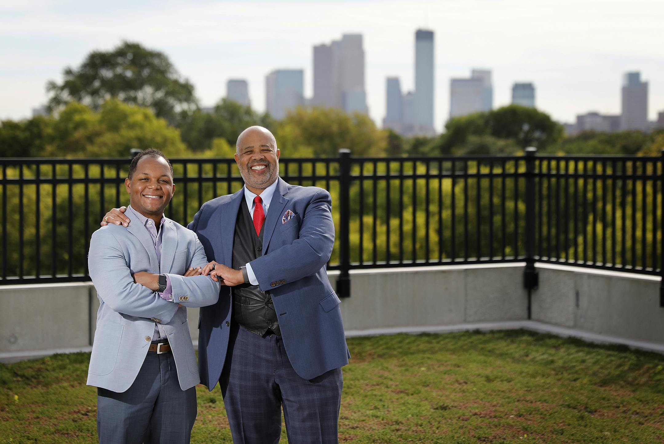 Meda CEO Gary Cunningham, right, poses for a photo with Jashan Eison, CEO of H&B Elevators, with the Minneapolis skyline in the background. ] LEILA NAVIDI ï leila.navidi@startribune.com BACKGROUND INFORMATION: Meda CEO Gary Cunningham poses for a photo with Jashan Eison, CEO of H&B Elevators, at the Meda office in Minneapolis on Monday, September 24, 2018.