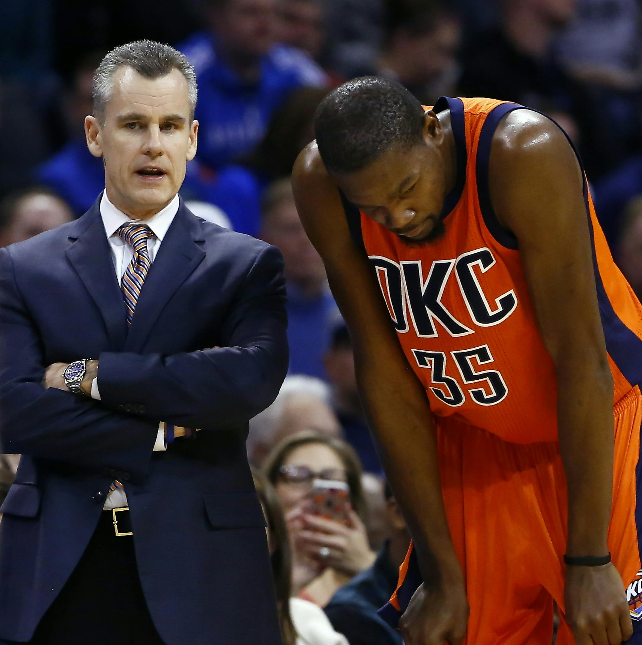 Oklahoma City Thunder head coach Billy Donovan, left, talks with Oklahoma City Thunder forward Kevin Durant, right, in the fourth quarter of an NBA basketball game in Oklahoma City, Sunday, Dec. 27, 2015. Oklahoma City won 122-112. (AP Photo/Alonzo Adams) ORG XMIT: MIN2016012218241423