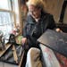 Photo by Liz Rolfsmeier 102: New Northfield resident Glynnis Lessing showed supplies used during a recent workshop in her milk house studio, where she