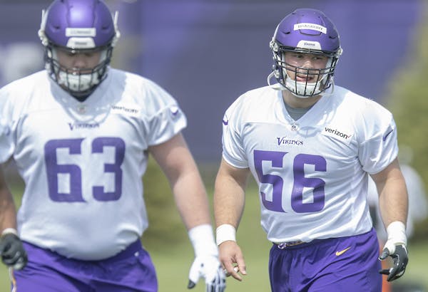 Minnesota Viking's rookie center, right, Garrett Bradbury worked out during a mini-camp practice at the Twin Cities Orthopedic Center, Friday, May 3, 