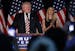 Ivanka Trump, right, listens as her father Republican presidential candidate Donald Trump delivers a policy speech on child care, Tuesday, Sept. 13, 2