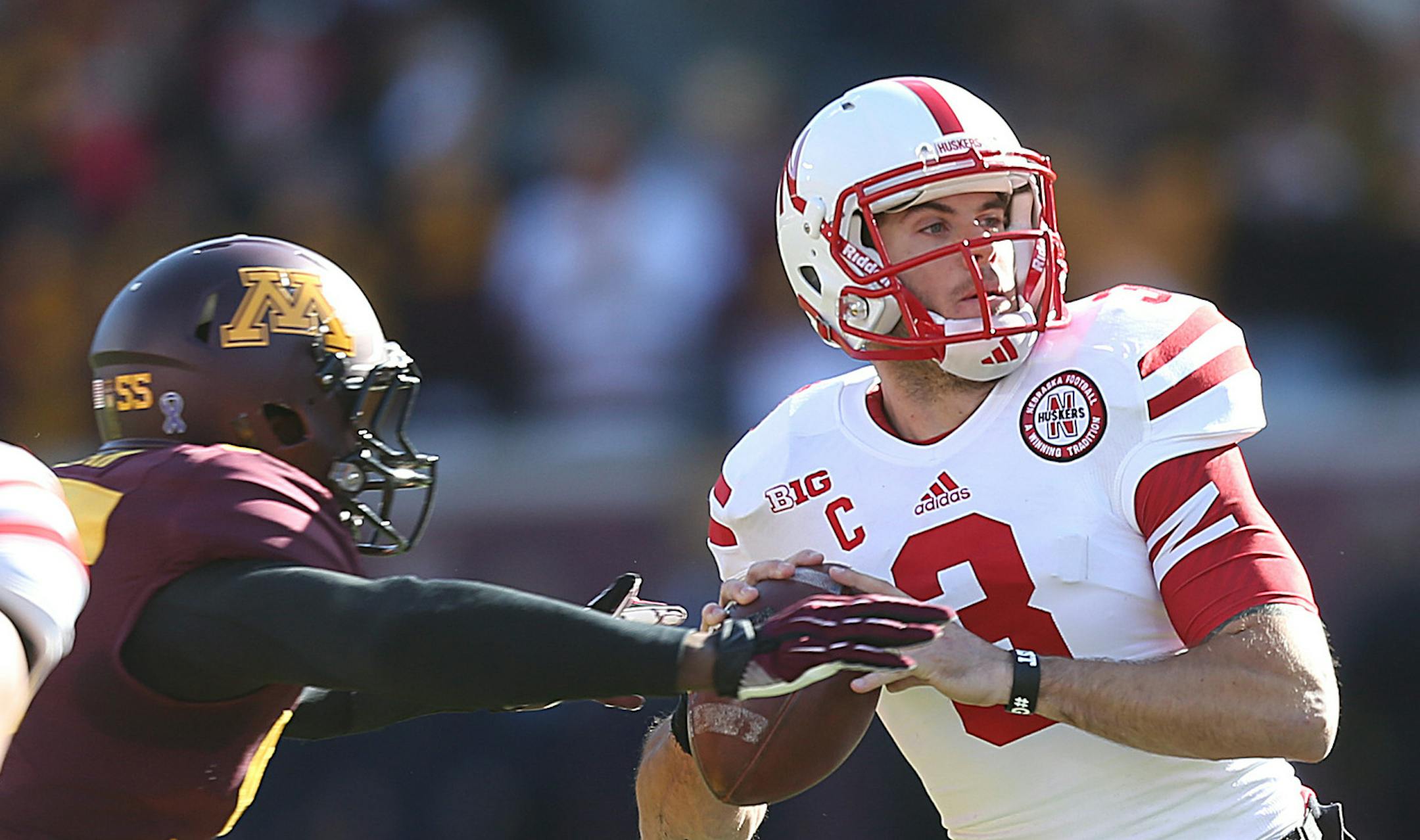 Nebraska quarterback Taylor Martinez was hurried by Minnesota defenders in the first half.]JIM GEHRZ ‚Ä¢ jgehrz@startribune.com Minneapolis, MN / Oct 27, 2013, 11:00 AM BACKGROUND INFORMATION- The Minnesota Golden Gopher football team played the Nebraska Cornhuskers at TCF Bank Stadium. Minnesota won, 34-23.