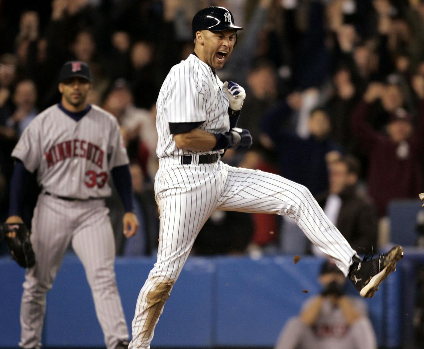 Carlos Gonzalez/Star Tribune October 6, 2004 New York, NY &#xf1; Yankee Stadium &#xf1; ALDS &#xf1; Game 2- Minnesota Twins vs. New York Yankees &#xf1; Yankees Derek Jeter Celebrates after scoring the winning run in the 12th inning.