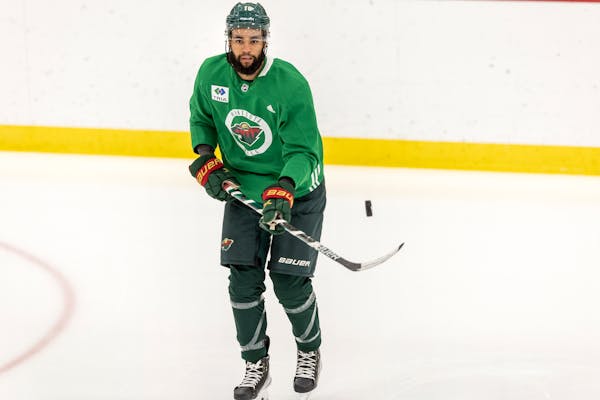 Wild forward Jordan Greenway is relegated to some drills and conditioning while he heals at training camp.