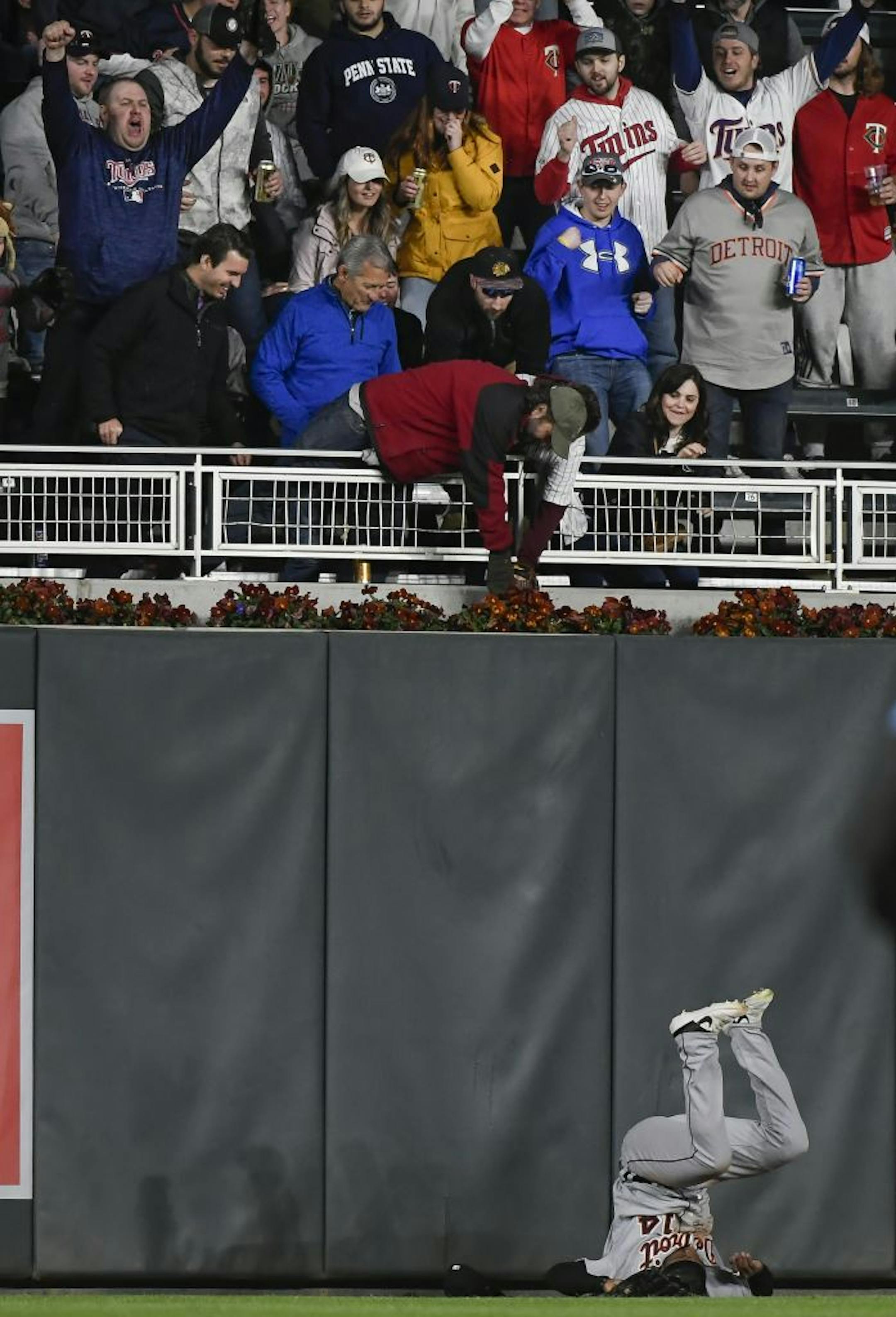 Detroit Tigers left fielder Christin Stewart (14) was unable to catch a home-run ball hit by Minnesota Twins third baseman Marwin Gonzalez (9) in the bottom of the sixth inning.