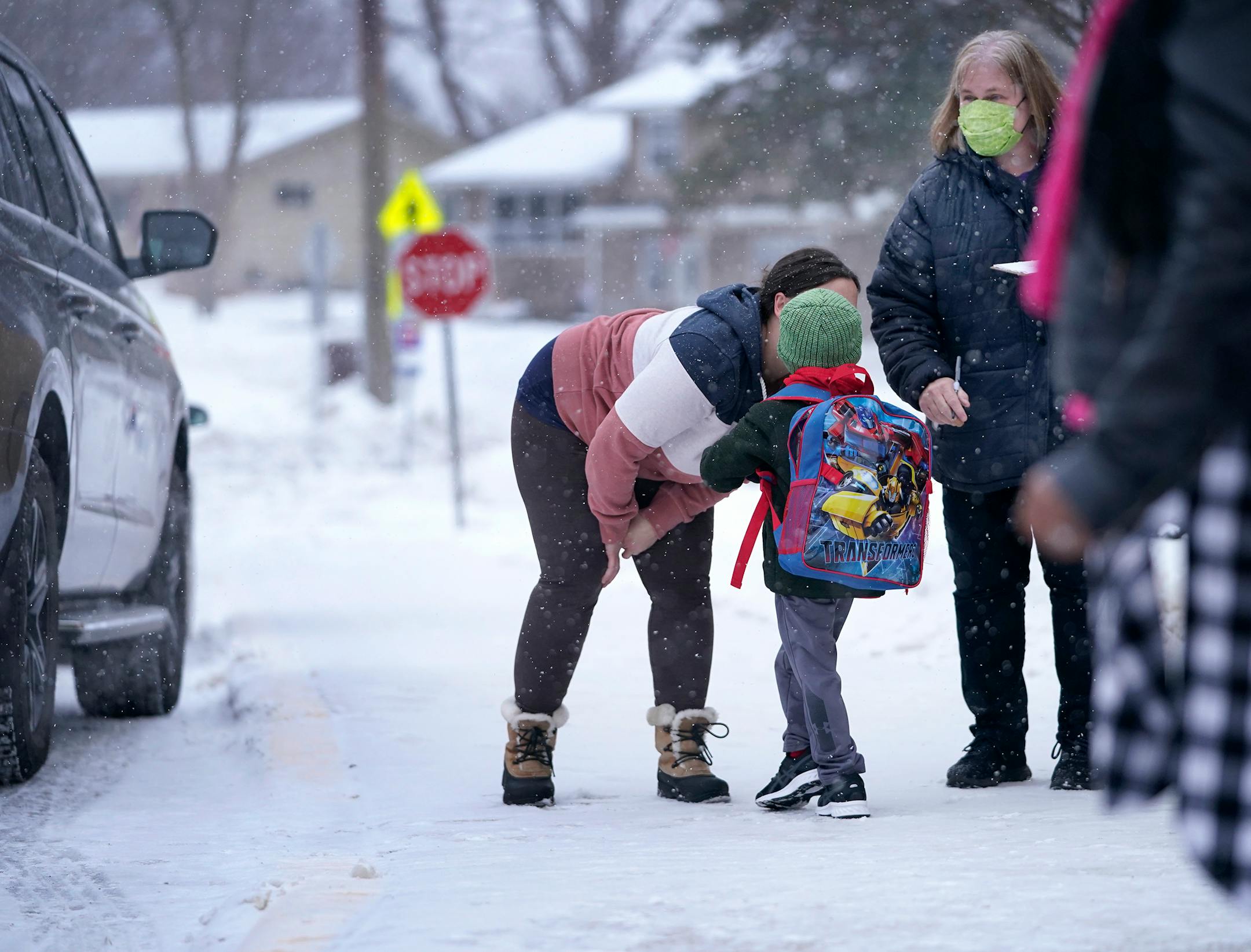 In person learning returned for kindergarten through second graders at Sonnesyn Elementary School Tuesday in New Hope. Here, a young student kissed his mom during drop-off on the first day of in-classroom learning Tuesday.