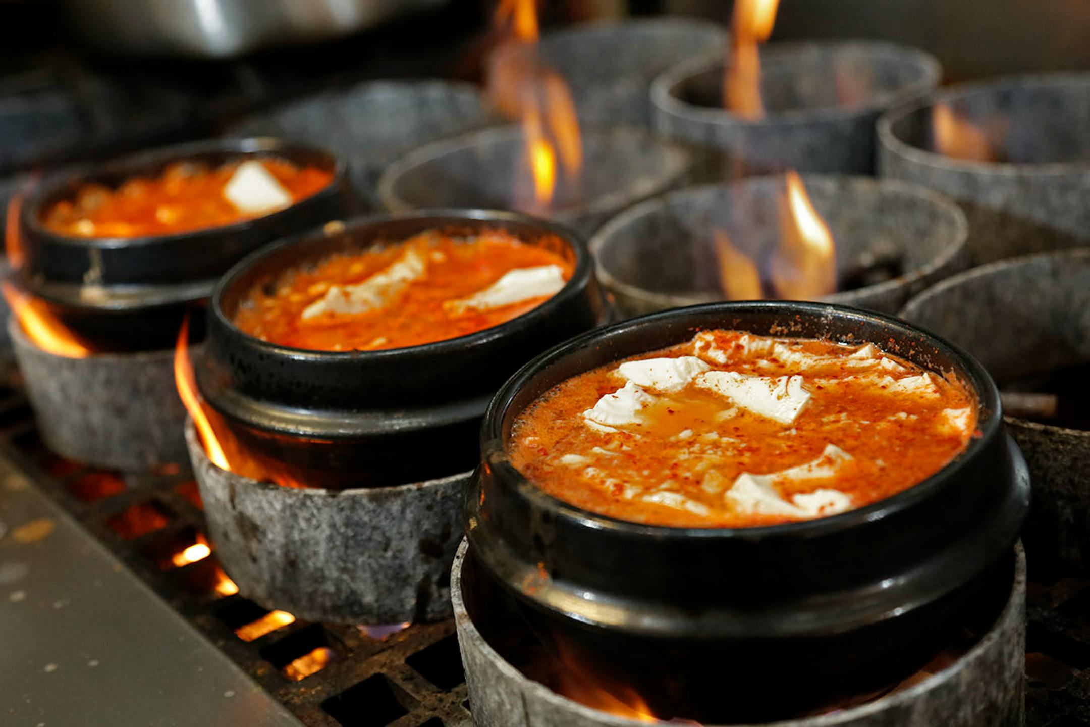 Kimchi Tofu House, near the U of M in Minneapolis, specializes in spicy Korean soup called sundubu. It sells 12 varieties and customers can choose the level of spiciness, done by varying the amount of Korean chili flakes called gochugaru. ] Star Tribune/Tom Wallace • tom.wallace@startribune.com