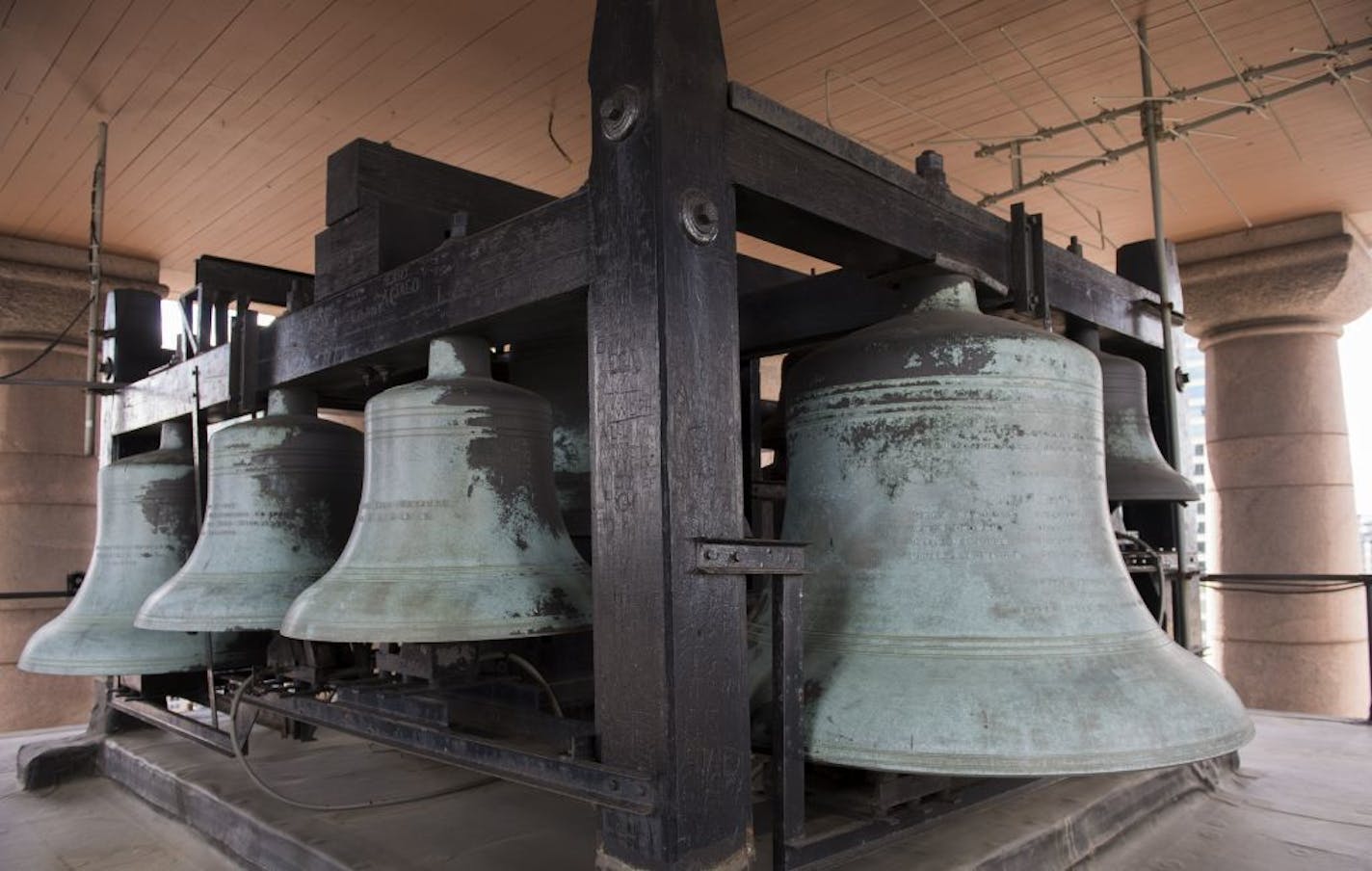 The massive bells atop the building were once played � by candelight � by a man who climbed more than 400 steps to get to the bell tower. Today, members of the Tower Bell Foundation play the bells with the help of a keyboard located in the first-floor rotunda.