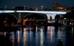 FILE- The I-35W Bridge bathed in blue light Friday, July 1, 2016, in Minneapolis, MN. (DAVID JOLES/STARTRIBUNE)