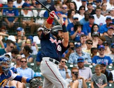 Minnesota Twins' Jake Cave hits an RBI-double in the fifth inning of a baseball game against the Chicago Cubs, Sunday, July 1, 2018, in Chicago. (AP P