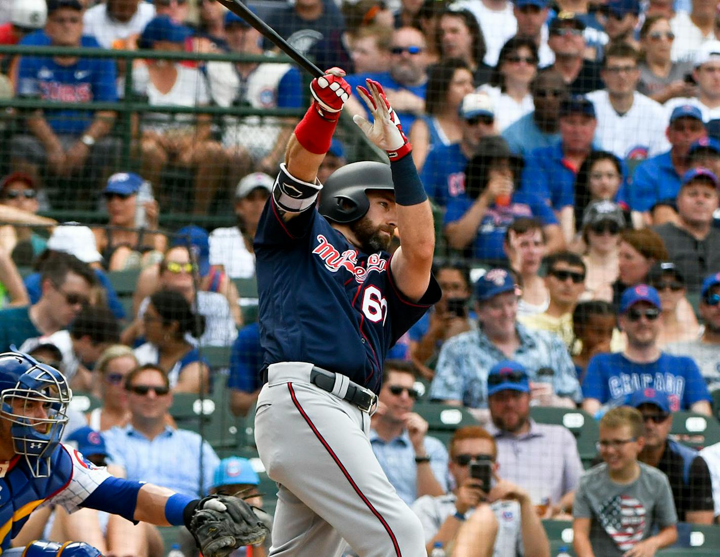 Minnesota Twins' Jake Cave hits an RBI-double in the fifth inning of a baseball game against the Chicago Cubs, Sunday, July 1, 2018, in Chicago. (AP Photo/Matt Marton)