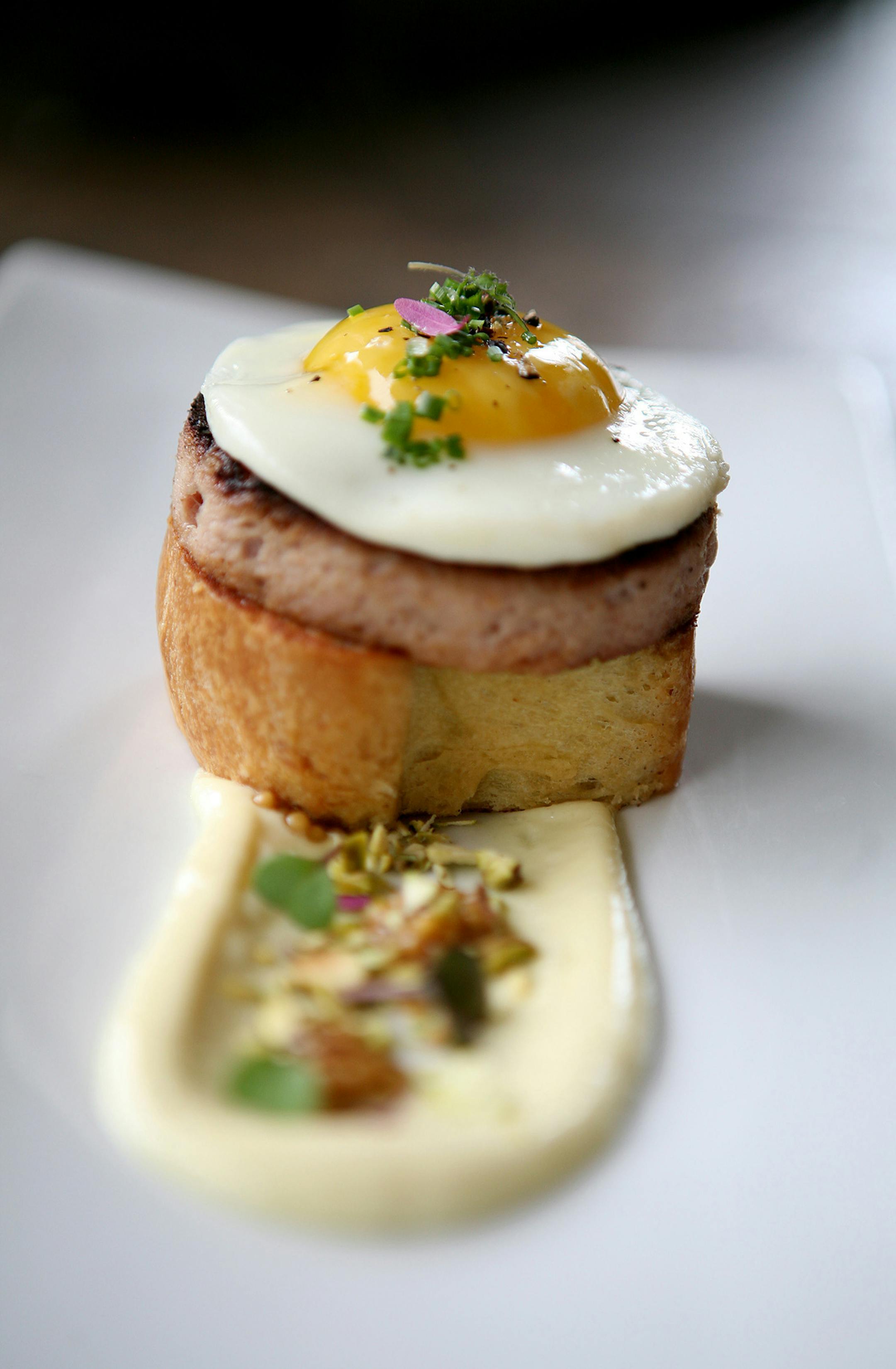 Bologna sandwich with fried egg, brioche and mustard aioli at Corner Table in Minneapolis June 7, 2013. (Courtney Perry/Special to the Star Tribune)