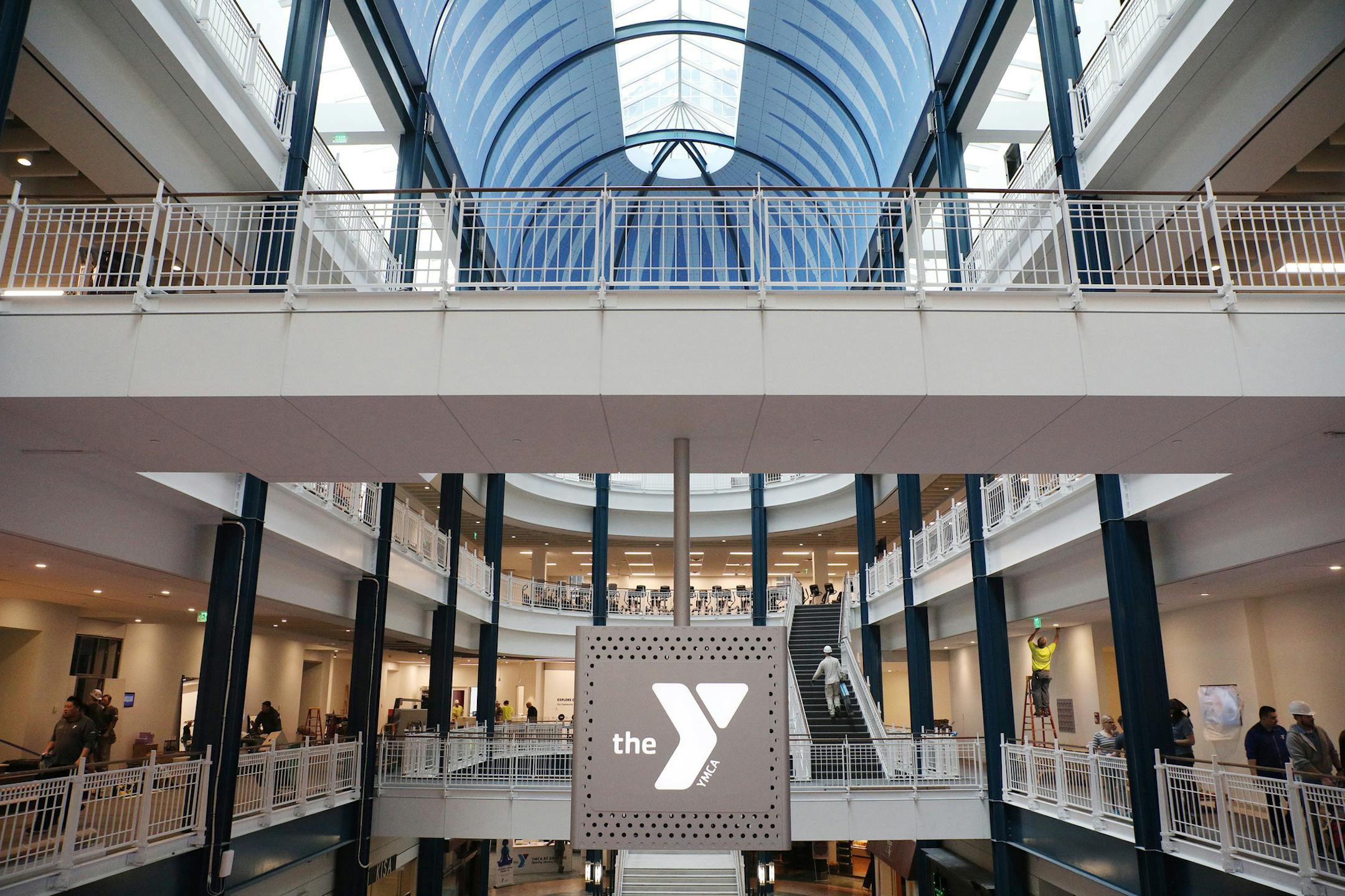 Construction workers readied the new YMCA on Nicollet Mall for it's opening later this week. ] ANTHONY SOUFFLE &#x2022; anthony.souffle@startribune.com Workers readied the new YMCA on Nicollet Mall for it's opening later this week Wednesday, Jan. 24, 2018 in the Gaviidae Common building in downtown Minneapolis. The new $30 million space is five floors of the building and includes some national firsts including an equity innovation lab, a wellbeing center for yoga and meditation, a huge spinning