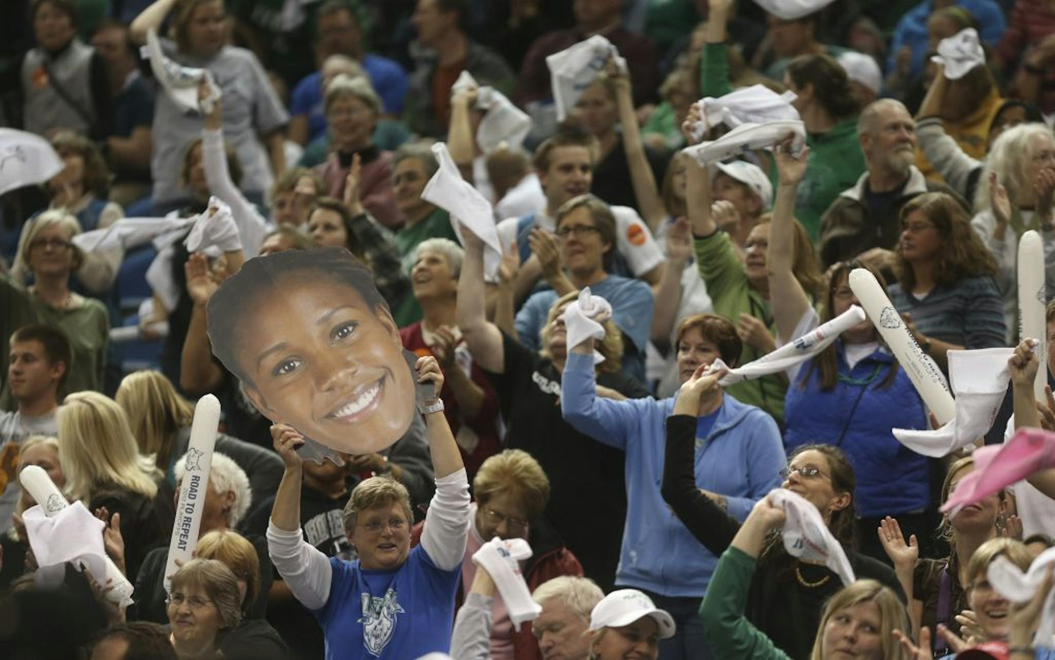 Fans waved their towels along with w big picture of Rebekkah Brunson in the first half of game one of the Western conference finals at the Target Center in Minneapolis Min., Thursday October 4, 2012. Lynx won 94-77.
