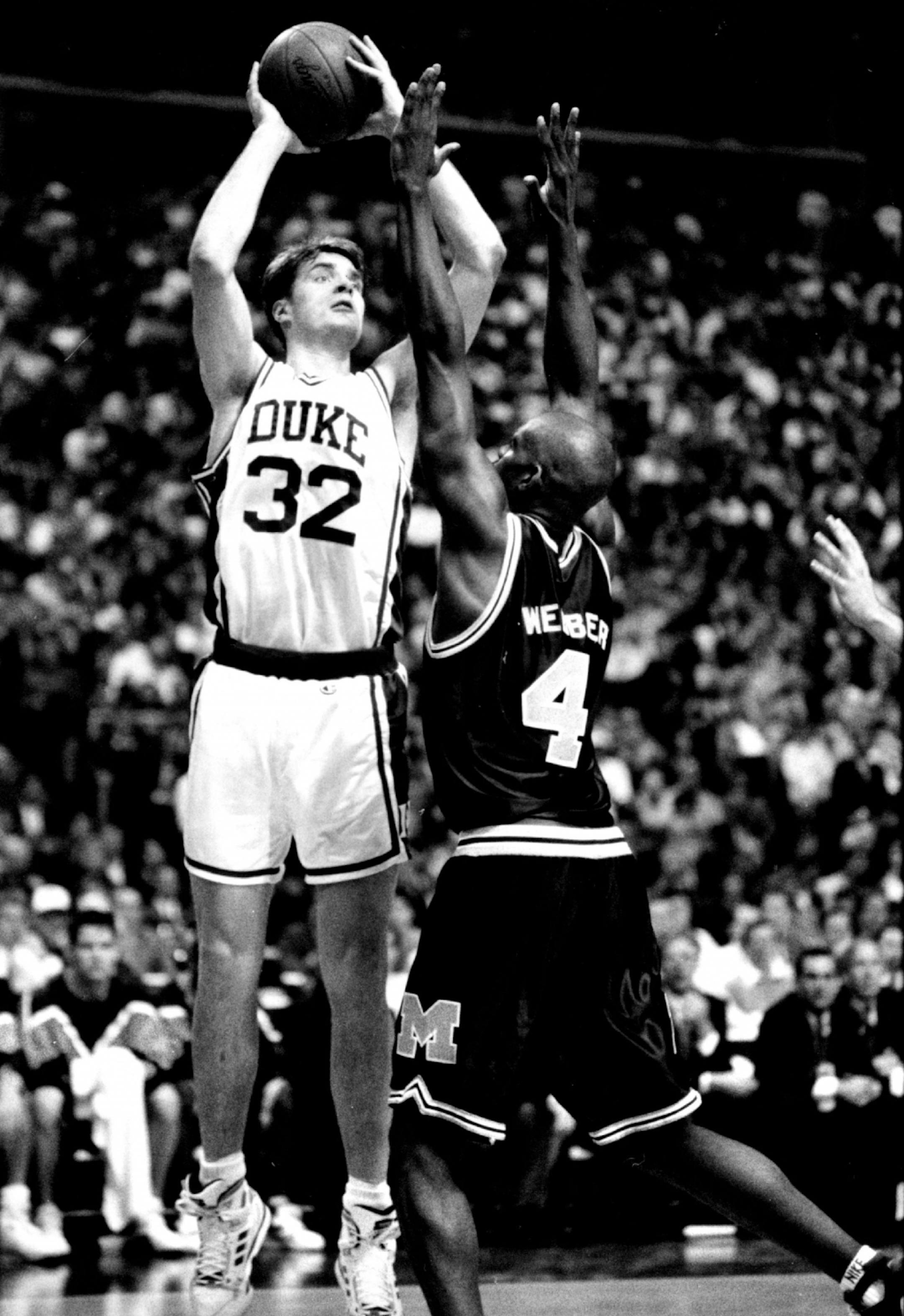 Duke's Christian Laettner shoots against Michigan's Chris Webber in the 1992 Final Four. (Brian Peterson/Star Tribune)