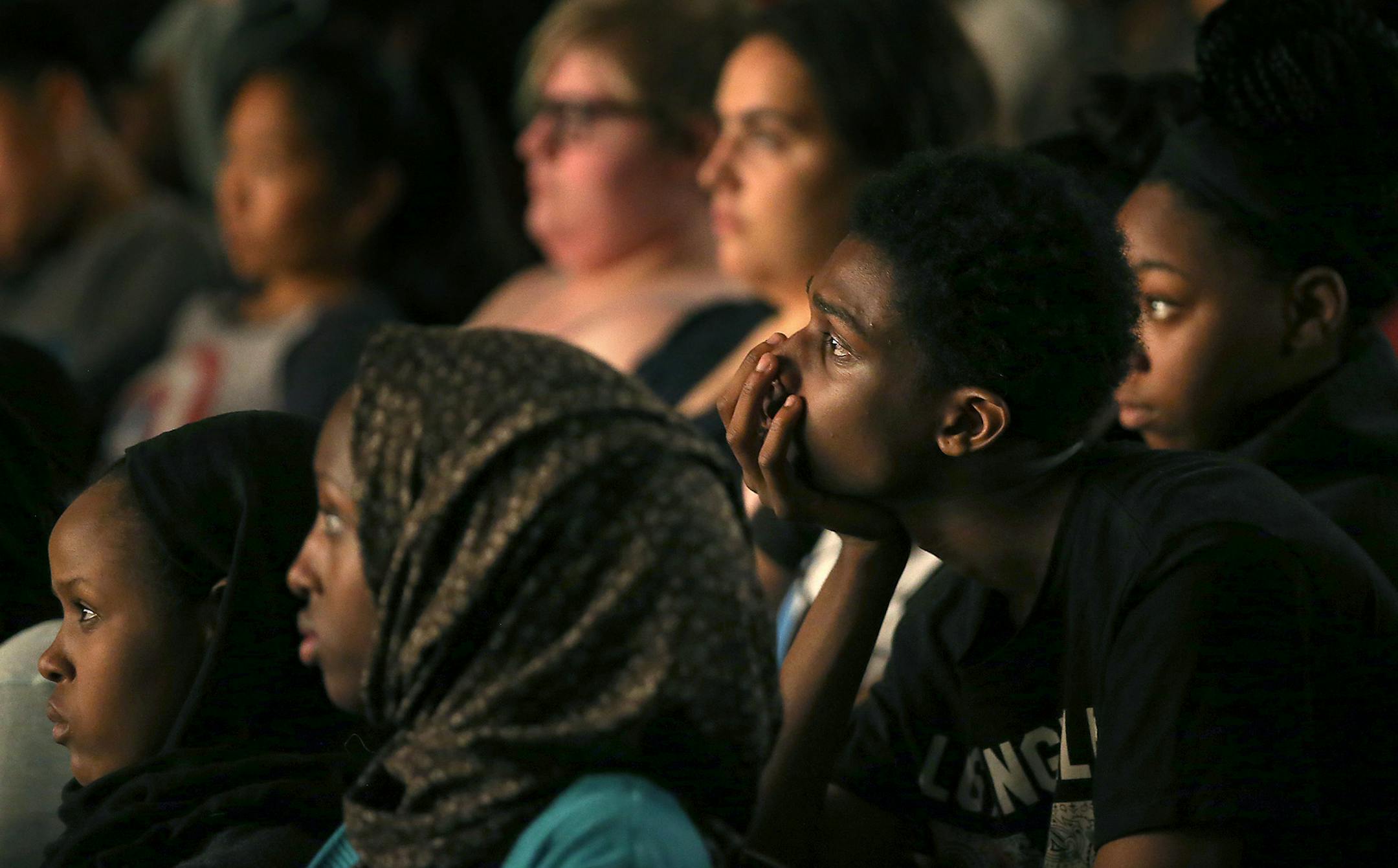 Central High School students listened to Kokayi Ampah, a location manager who has worked on many blockbuster movies, as he spoke to an assembly of students at the school, Friday, June 3, 2016 in St. Paul, MN. Relatives and supporters of famed photographer Gordon Parks are kicking off a fundraising effort this week to cover the estimated $1 million transformation of Landmark Plaza in downtown St. Paul. The memorial is part of a larger effort to expose young black men to a future in the arts. ] (E