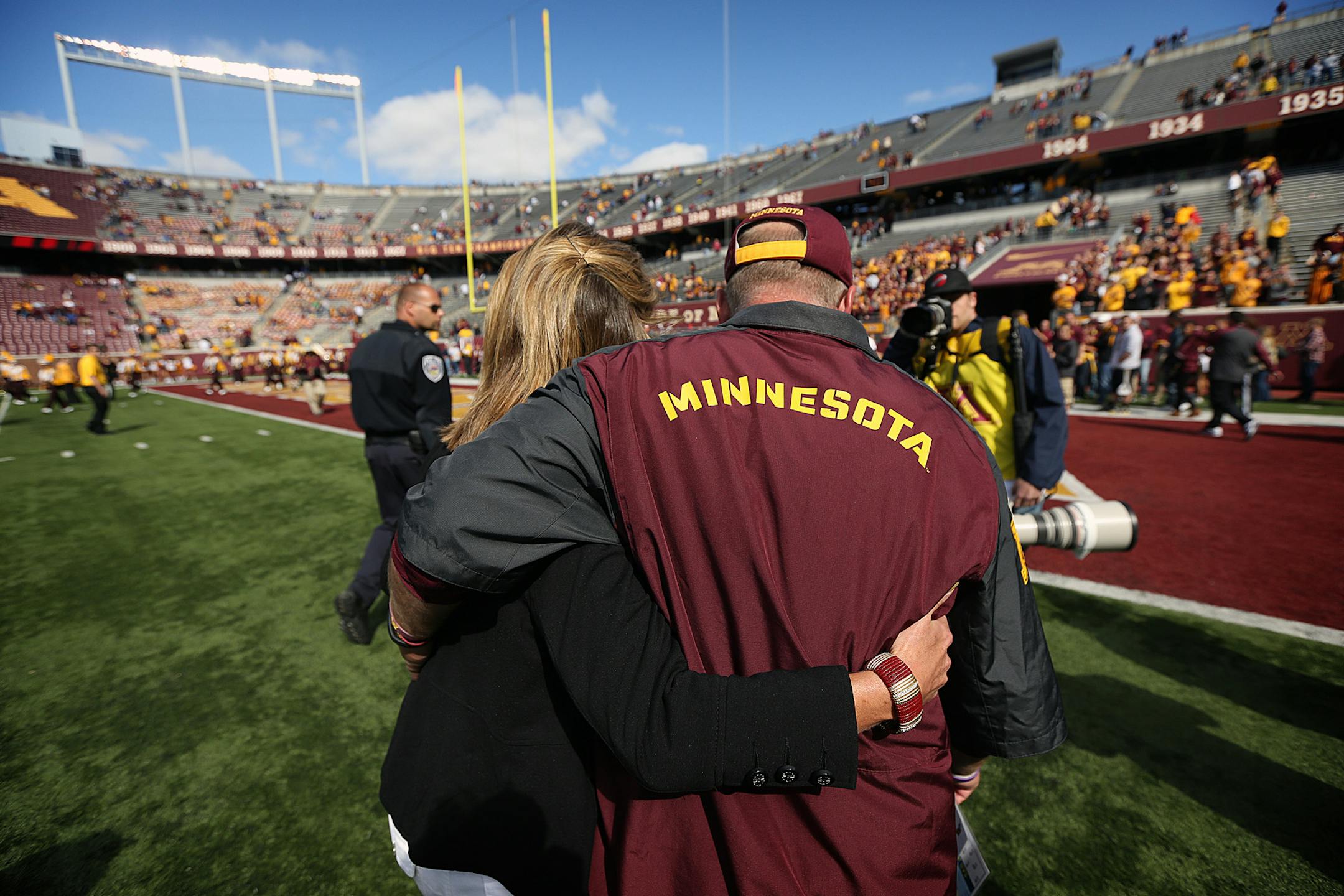 Coach Jerry Kill was greeted after the game by his wife, Rebecca. ] JIM GEHRZ ‚Ä¢ jgehrz@startribune.com Minneapolis, MN / Sept 21, 2013, 11:00 AM BACKGROUND INFORMATION- The University of Minnesota football team, lead by head coach Jerry Kill, played San Jose State at TCF Bank Stadium. Kill suffered a seizure on the sidelines last week, but returned to coach the team on Saturday. A rally in support of the coach was held prior to the game, organized by The Epilepsy Foundation of
