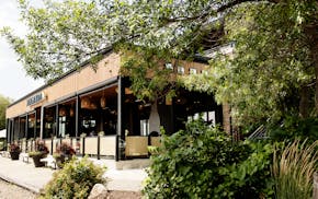 Macanda's indoor/outdoor patio that overlooks Lake Minnetonka