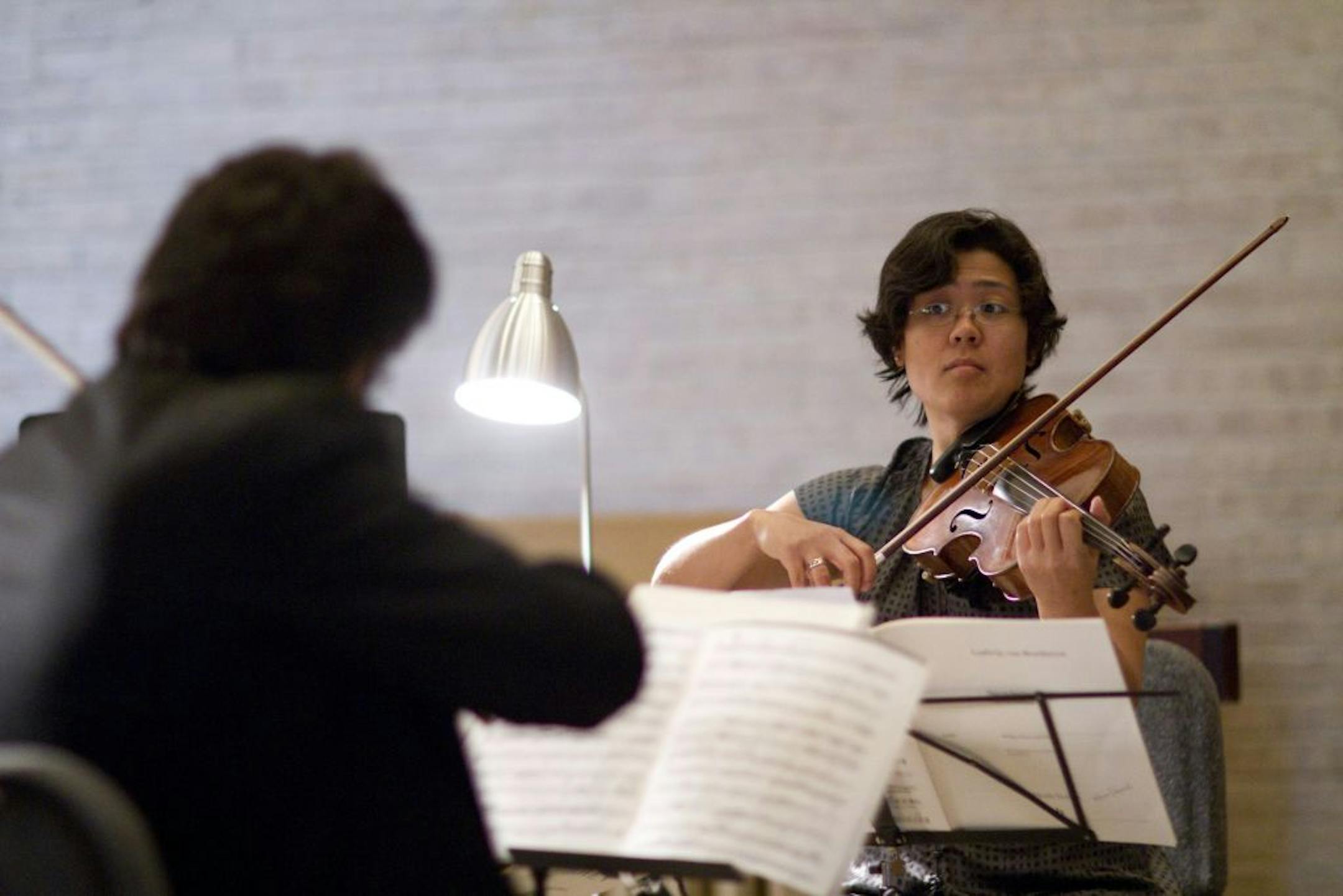Allifranchini and Papach touched up a piece before the concert. He is associate concertmaster and she is acting principal viola of the St. Paul Chamber Orchestra.