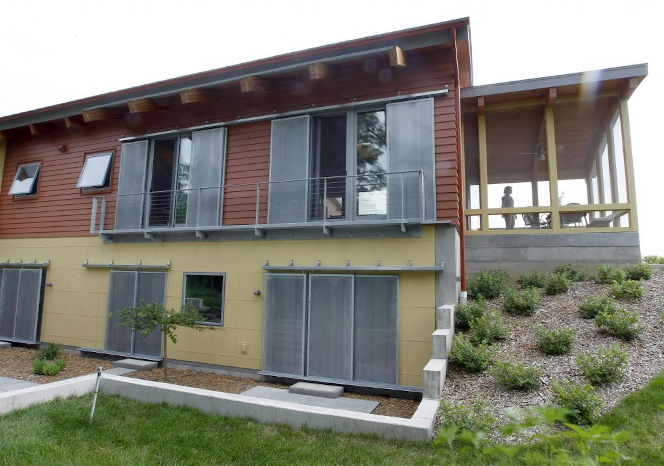 The Energy efficient home Jack and Mary Spears home just outside of St. Peter. The back of the house is fitted with heavy sliding mesh sreens to keep the heat out.