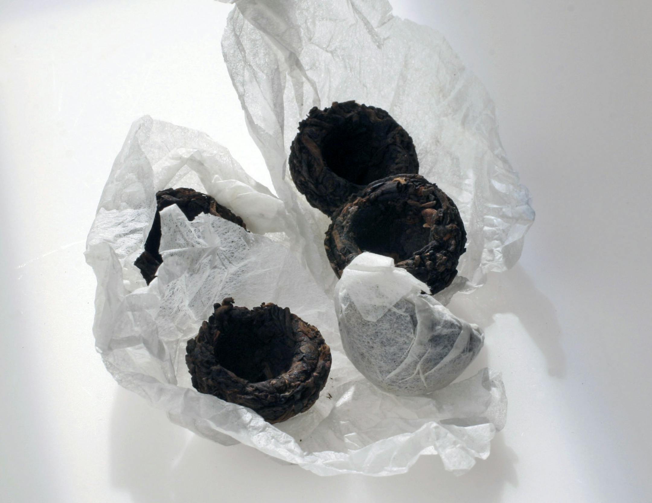 Pu erh: Typically a pressed tea, this aged, fermented dark tea has a strong pungeant taste and is touted for its health benefits. This particular version is pressed into bird nests, a form of good luck and fortune in China.