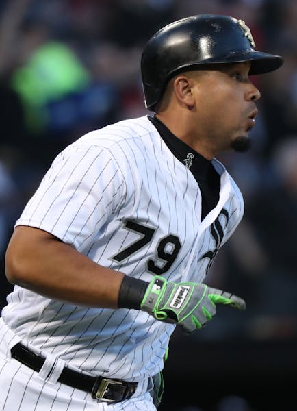 The Chicago White Sox's Jose Abreu (79) rounds the bases after hitting a two-run home run in the first inning against the Minnesota Twins at Guarantee