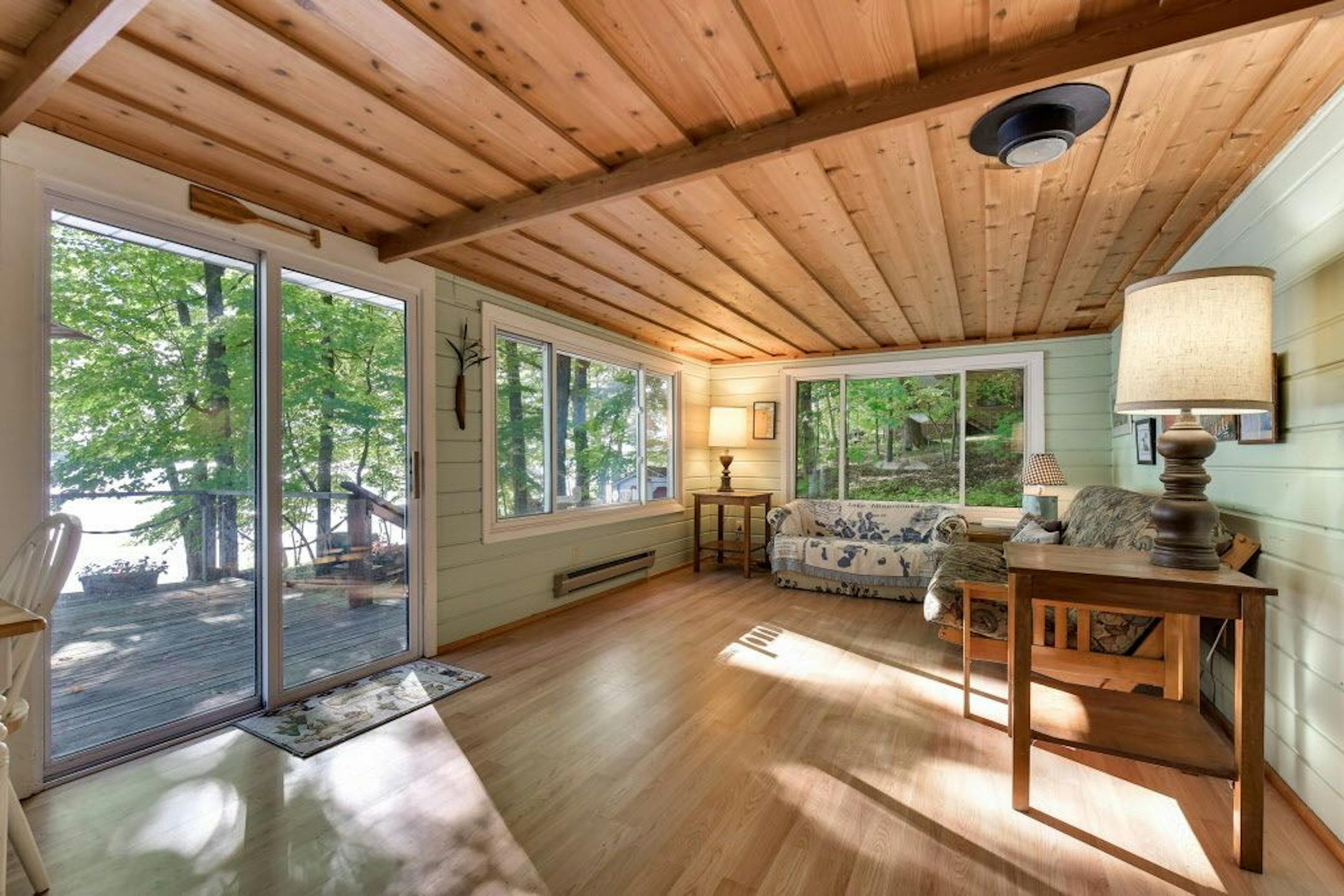 A sliding-glass door opens to the deck.