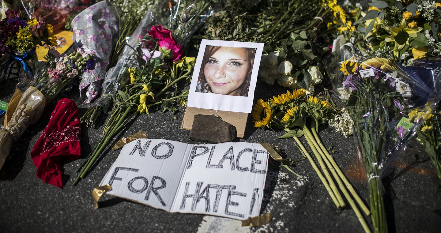 FILE &#xf3; A memorial for Heather Heyer at the scene where she was killed when a man drove into a crowd during a protest against a rally of white nationalists in Charlottesville, Va., Aug. 13, 2017. The Daily Stormer, a neo-Nazi website, was kicked off of both GoDaddy.com and Google after mocking Heyer. (Edu Bayer/The New York Times) ORG XMIT: MIN2017081415333528