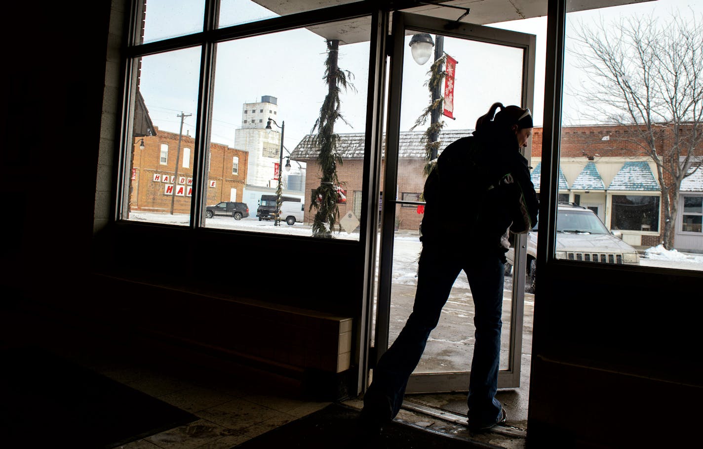 A customer left the post office on Main St. Renville. The Hardware Hank store, left closed about three years ago and the store sits empty. ] GLEN STUBBE * gstubbe@startribune.com Wednesday, January 14, 2015