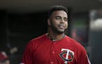 Minnesota Twins designated hitter Nelson Cruz (23) walked the dugout before Friday night's game against the Kansas City Royals.