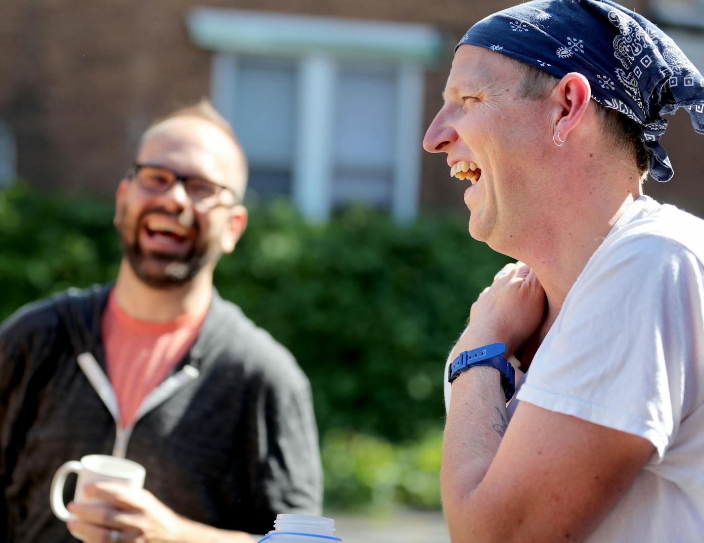 Brake Bread co-owners Micah Taylor, left, who handles the business end, and Nate Houge, the baker, enjoy a laugh while being interviewed outside the artisanal bakery that got it's start delivering bread to the area by bicycle and is now located on W. 7th near downtown and seen Thursday, Sept. 1, 2016, in St. Paul, MN.](DAVID JOLES/STARTRIBUNE)djoles@startribune Brake Bread, a new W. Seventh Street bakery, has humble beginnings: from a basket rigged to a bicycle. That's not where they baked their