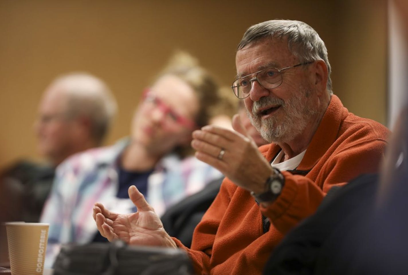 Tom O'Toole of Minneapolis during the discussion of a poem by Anna Akhmatova at the Lifelines meeting last Thursday.