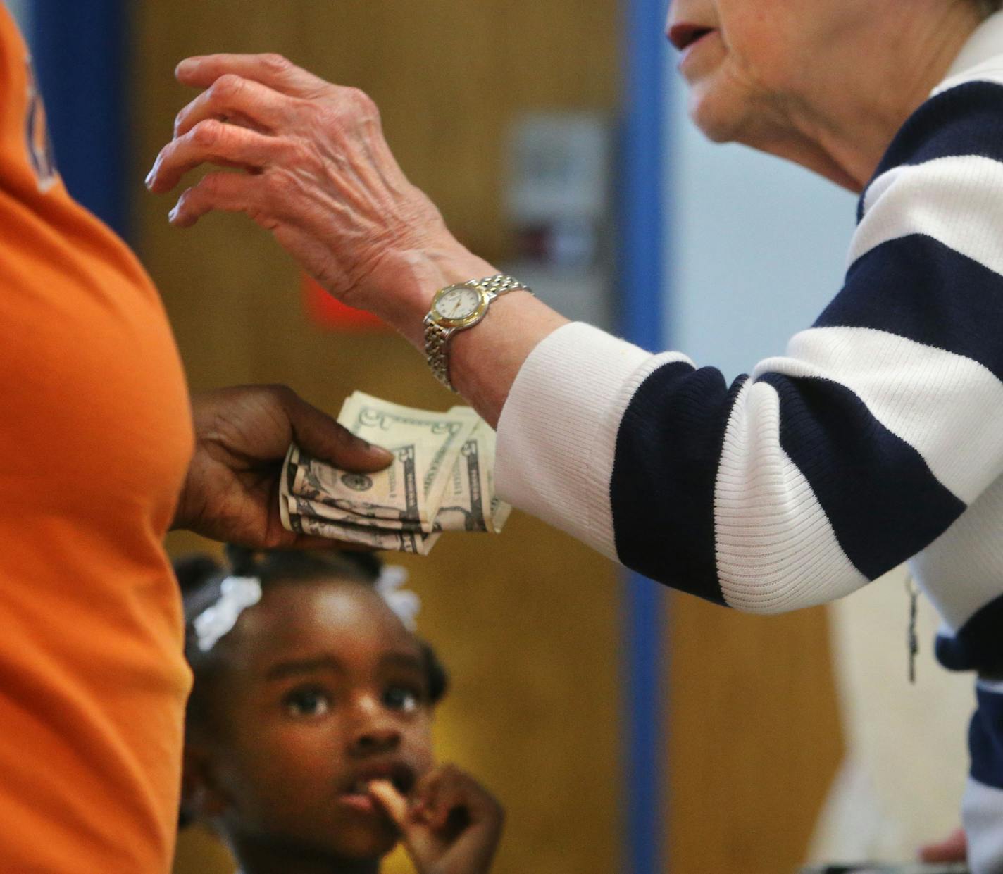 Here, Mary Jo Copeland offters money, love and words of encouragement to a young mother and child who had come for help at her original facility, Sharing and Caring Hands Thursday, July 16, 2015, in Minneapolis, MN.]](DAVID JOLES/STARTRIBUNE)djoles@startribune.com Fifteen years ago, Mary Jo Copeland set off on a high-profile campaign to build a 200-bed orphanage. Since then, she has struggled to raise the $30 million needed for the controversial campus. But for more than a decade she kept the fa