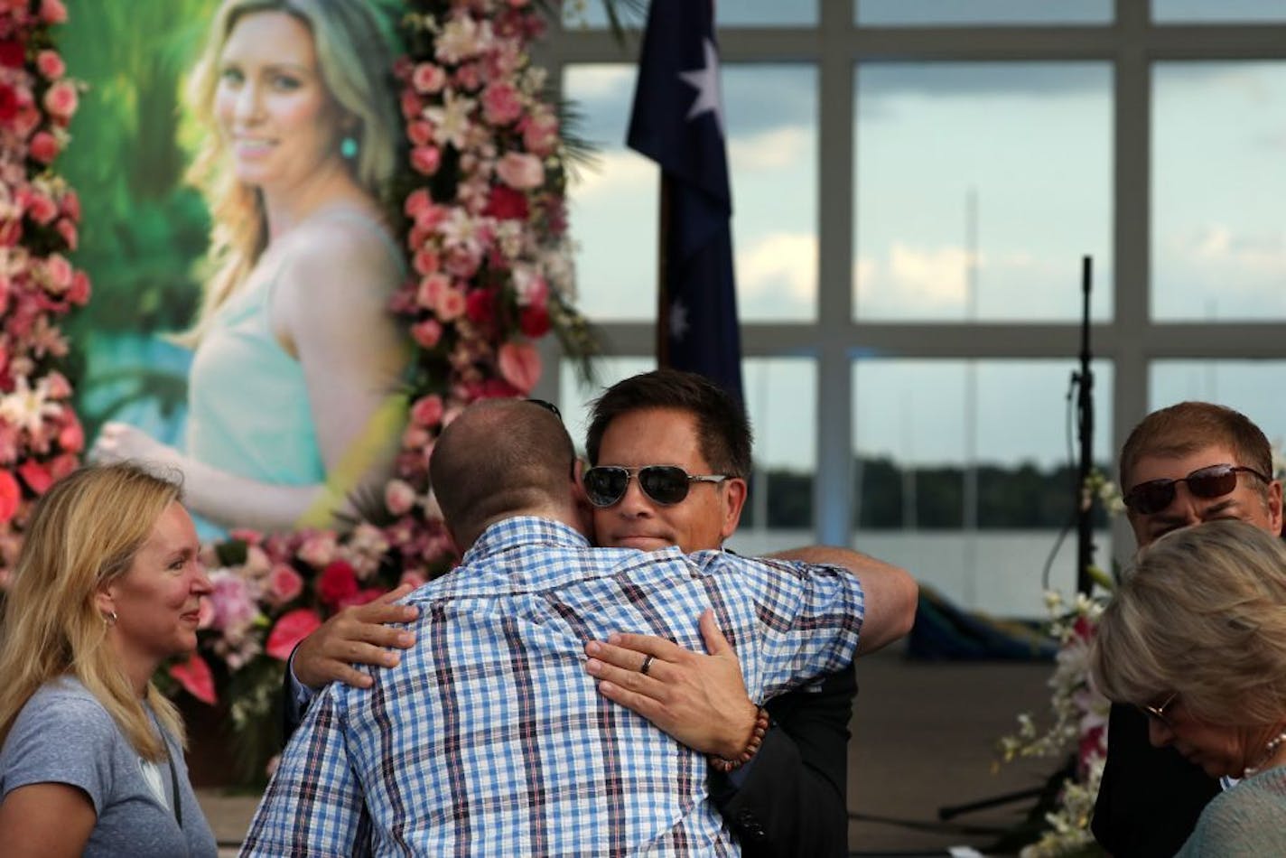 Don Damond hugged supporters and loved ones prior to the memorial to his fiancee, Justine, at Lake Harriet Band Shell on Friday.