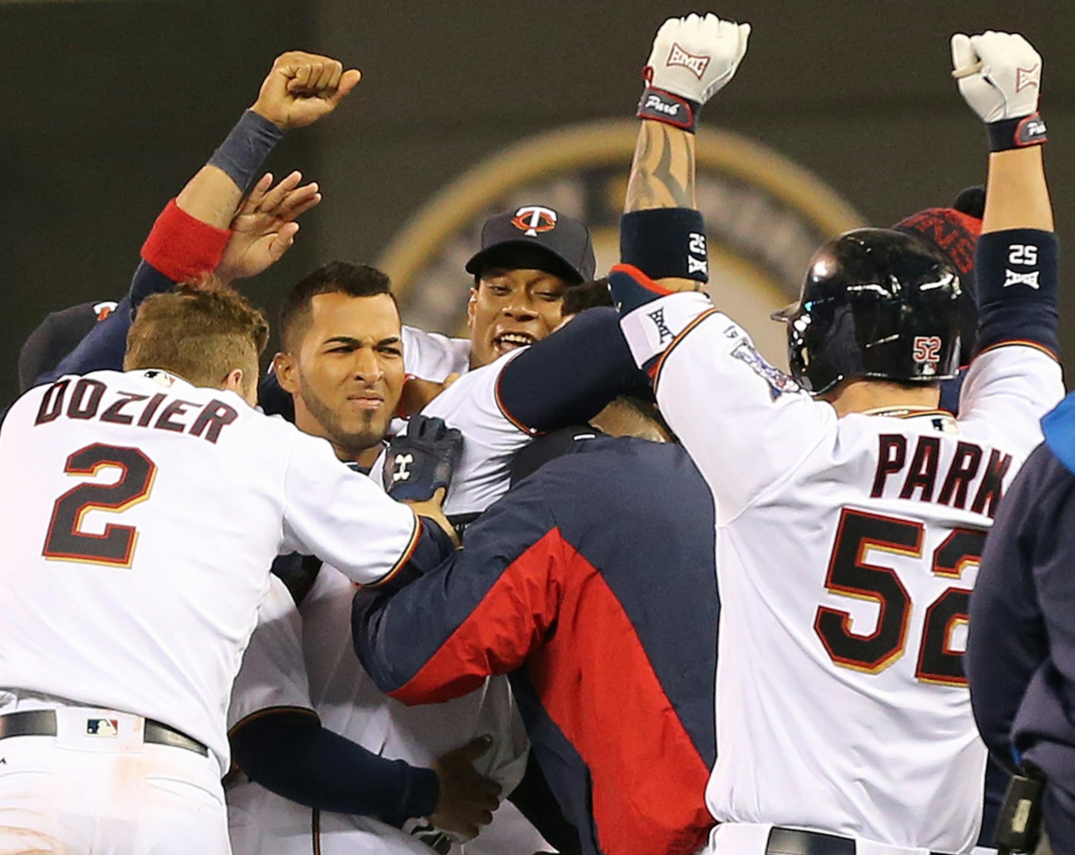 Minnesota Twins third baseman Miguel Sano (22) was mobbed by teammates after hitting a single in the ninth inning scoring Brian Dozer for a 6-5 win at Target Field Tuesday April 25, 2016 Minneapolis, MN.