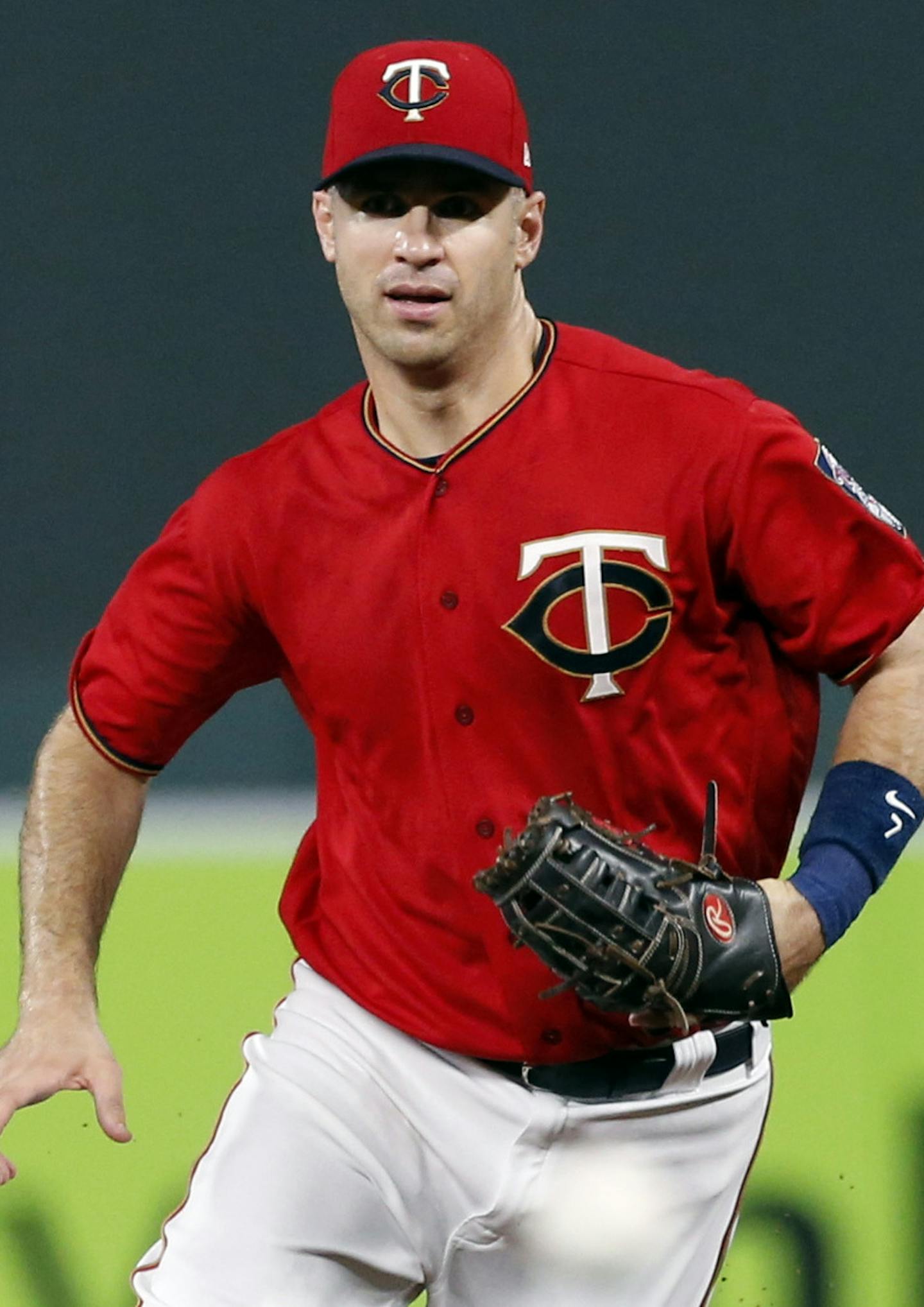 Minnesota Twins first baseman Joe Mauer defends first base in a baseball game against the San Diego Padres Tuesday, Sept. 12, 2017, in Minneapolis. (AP Photo/Jim Mone)