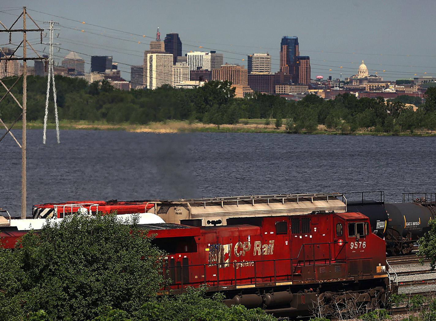 Locomotives traveled on tracks next to Highway 61 near the Canadian Pacific rail yard by Pig's Eye Lake. ] JIM GEHRZ &#x201a;&#xc4;&#xa2; jgehrz@startribune.com / St. Paul, MN / June 3, 2014 / 10:00 AM / BACKGROUND INFORMATION: Canadian Pacific Railroad wants to expand its rail yard southeast of St. Paul to accommodate 2-mile-long trains by filling in about 7 acres of wetlands. The plan has drawn fire from environmental groups, because the area is home to endangered Balndings turtles and is acro