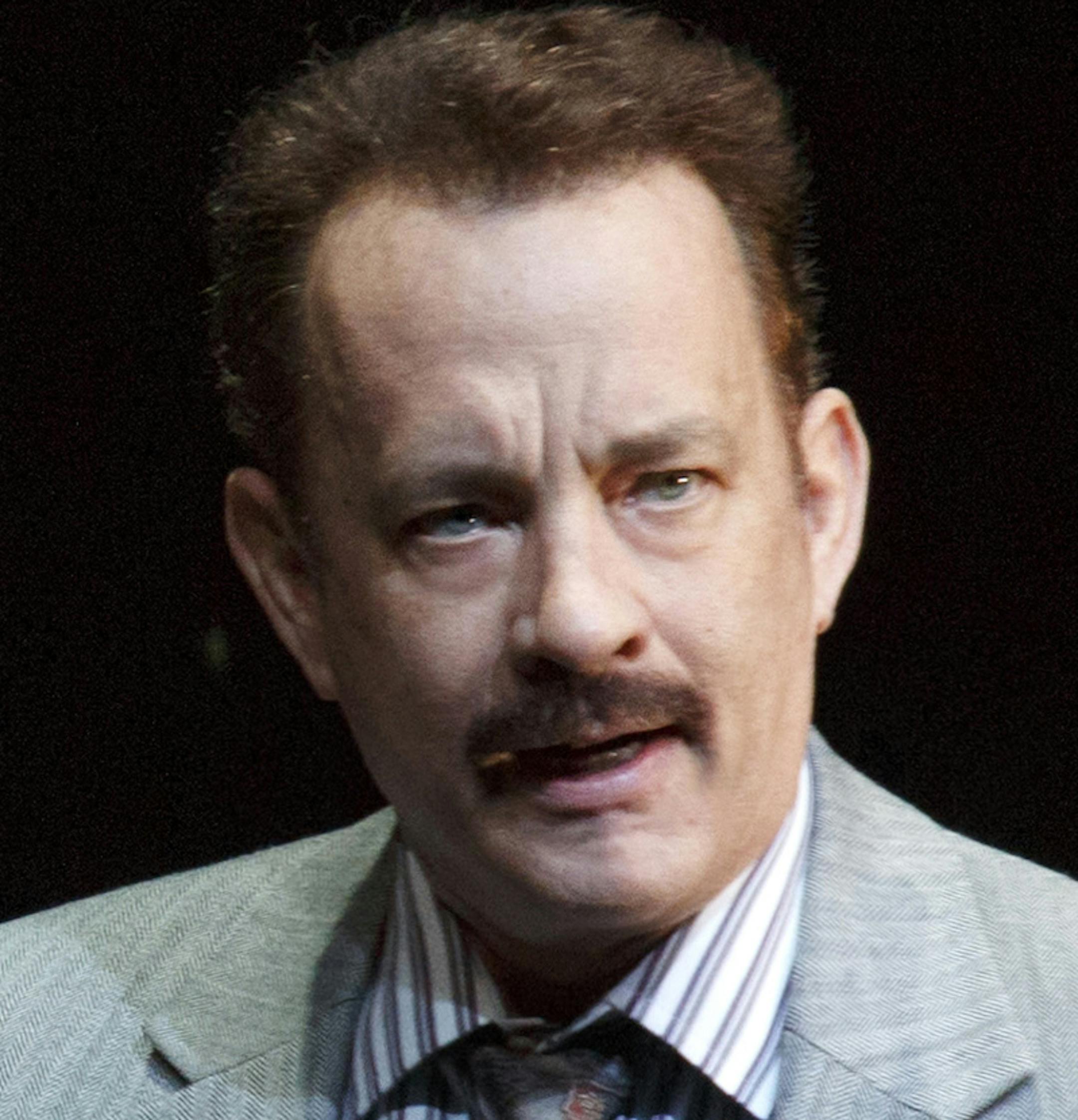 This theater image released by Boneau/Bryan-Brown shows Tom Hanks as tabloid columnist Mike McAlary during a performance of "Lucky Guy," playing at the Broadhurst Theatre in New York. (AP Photo/Boneau/Bryan-Brown, Joan Marcus) ORG XMIT: MIN2013043015083684