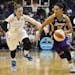 Los Angeles Sparks guard Kristi Toliver (20) pushes the ball down the court against Minnesota Lynx guard Lindsay Whalen (13) in the first half of a WN